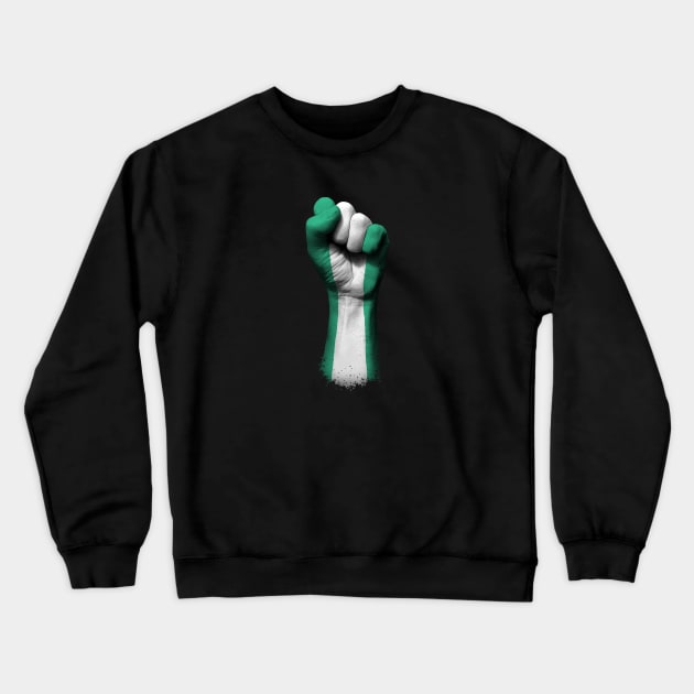 Flag of Nigeria on a Raised Clenched Fist Crewneck Sweatshirt by jeffbartels